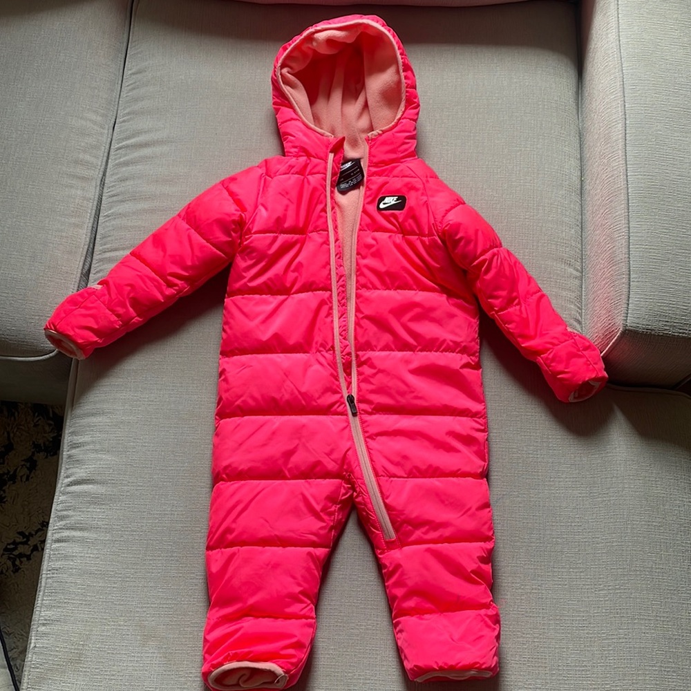 Nike Snowsuit in Fuchsia: like new condition, worn once.